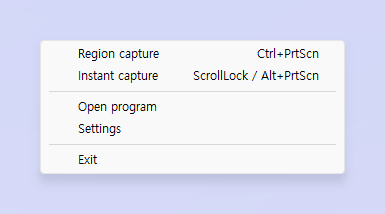 O menu do ícone do ZunShot na área de notificação: captura de área e captura instantânea com seus atalhos, abrir programa, configurações e sair